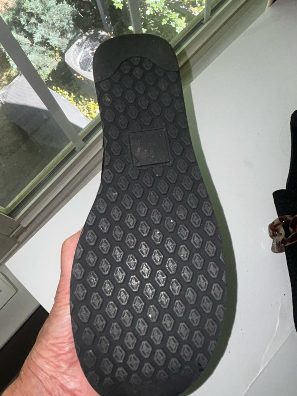 Dolce Vita Black Perforated Slip-On Loafers with Tortoiseshell Chain Accent - Picture 5 of 6